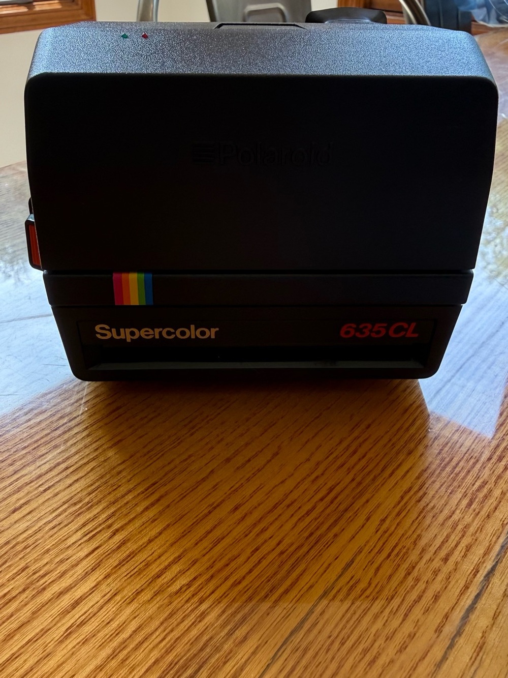 Polaroid Black Supercolor 635CL with Rainbow Accent